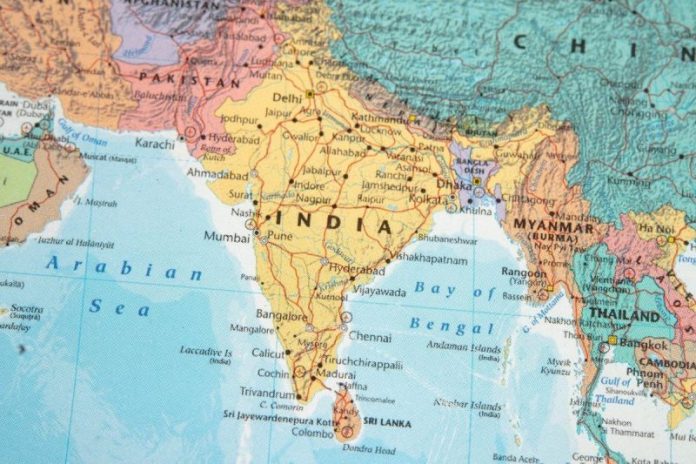 <strong>India has approved a sweeping overhaul of royalty rates for several critical minerals, continuing its campaign to expand domestic mining and reduce reliance on Chinese imports.</strong>
Under the revised framework, graphite with at least 80 percent fixed carbon will be charged a 2 percent royalty based on the average sale price (ASP) determined by the Indian Bureau of Mines, while graphite with lower purity will carry a 4 percent rate.
Caesium and rubidium will each be levied a 2 percent royalty on the ASP of metal contained in the ore, and zirconium will be charged 1 percent.
The government said the changes would encourage more rational bidding in auctions and attract greater private participation in mineral exploration. “The above decision of the Union Cabinet will promote auction of mineral blocks containing caesium, rubidium and zirconium, thereby not only unlocking these minerals but also associated critical minerals found with them, such as lithium, tungsten, REEs, and niobium,” the statement read.
New Delhi has recently pushed to build a self-reliant critical mineral ecosystem amid mounting global supply chain pressures.
China, which produces more than 80 percent of the world’s rare earth elements and controls much of the refining capacity for battery metals, has tightened export restrictions in recent years.
At least nine mineral blocks were offered in the sixth tranche of auctions launched in September, including five graphite blocks, two rubidium blocks, and one each for caesium and zirconium.
These minerals are integral to India’s green industrial transition: graphite is used in electric vehicle (EV) batteries, zirconium in nuclear reactors, caesium in precision timing systems such as GPS, and rubidium in fiber optics and night vision equipment.
The royalty revision also complements broader measures under Prime Minister Narendra Modi’s administration to secure strategic minerals and reduce import dependency.
Earlier this year, India approved a US$1.9 billion plan to source critical materials used in batteries, electronics, and agriculture.
In addition, the government weeks ago was reported to be nearly tripling its production-linked incentive (PLI) program for rare earth magnet manufacturing to over 70 billion rupees (US$788 million), a major step up from the initial US$290 million proposal.
Pending cabinet approval, the expanded plan seeks to develop a full rare earth magnet supply chain for EVs, renewable energy systems, and defense applications.
In parallel, the government is also investing heavily in human capital to sustain this growth. The Ministry of Mines, in coordination with the Skill Council for Mining Sector (SCMS), has launched an initiative to train 5.7 million workers in mining-related occupations by 2030.
The skills gap study for 2025–2030 will map future workforce requirements and identify pathways to develop a “future-ready” labor pool capable of supporting new mineral projects.
“The report will come up with a detailed action plan for the sector on ways to impart skills training to millions of workers to cater to the increasing demand from the sector in the near future,” a senior government official told The Economic Times<em><em>.</em></em>
India currently imports about 60 percent of its graphite needs and remains a minor producer of most other critical minerals. The Modi administration aims to more than double mining’s share of GDP to 5 percent by 2030 from 2.2 percent today.
<strong>Securities Disclosure: I, Giann Liguid, hold no direct investment interest in any company mentioned in this article.</strong>
This post appeared first on investingnews.com